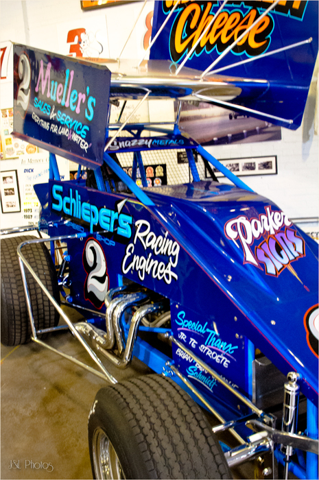 Winged sprint car racers also known as Outlaw racers use top mounted wings